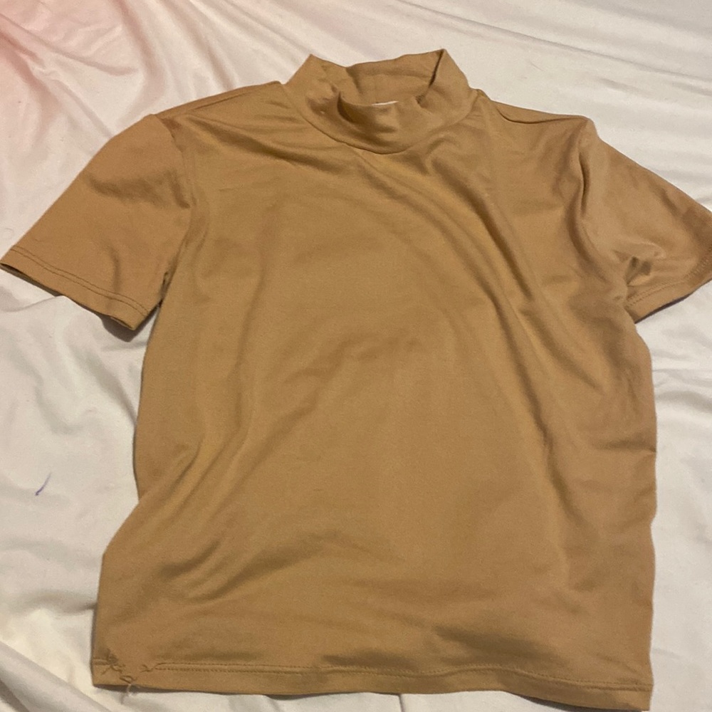 cute turtle neck , never worn , no tag , size s in juniors , good material